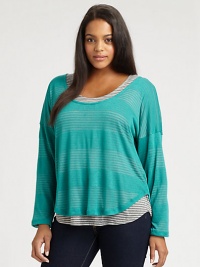 Offering twice the style of a traditional top, this striped design provides a perfectly layered look. Its curved hem grazes the hips to create an enviable silhouette.ScoopneckLong sleevesDropped shouldersPull-on styleAbout 26 from shoulder to hemRayon/polyesterMachine washMade in USA Offering twice the style of a traditional top, this striped design provides a perfectly layered look. Its curved hem grazes the hips to create an enviable silhouette.ScoopneckLong sleevesDropped shouldersPull-on styleAbout 26 from shoulder to hemRayon/polyesterMachine washMade in USA