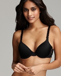 A smooth underwire cup bra with floral lace embellishments along straps and wings. Style #55362 A smooth underwire cup bra with floral lace embellishments along straps and wings. Style #55362