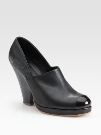 Smooth, burnished leather design backed by an ultra-textured heel and glazed leather toe cap. Embossed leather heel, 4½ (115mm)Covered platform, ½ (15mm)Compares to a 4 heel (100mm)Leather upperLeather liningBuffed leather solePadded insoleImportedOUR FIT MODEL RECOMMENDS ordering one half size up as this style runs small. Smooth, burnished leather design backed by an ultra-textured heel and glazed leather toe cap. Embossed leather heel, 4½ (115mm)Covered platform, ½ (15mm)Compares to a 4 heel (100mm)Leather upperLeather liningBuffed leather solePadded insoleImportedOUR FIT MODEL RECOMMENDS ordering one half size up as this style runs small.