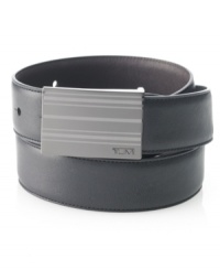 Change up your look with the reversible design of this modern-minded plaque buckle belt in smooth leather from Tumi. Change up your look with the reversible design of this modern-minded plaque buckle belt in smooth leather from Tumi.