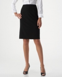 AGB's stylish pencil skirt impresses both coming and going, with button accents along the front yoke and a pretty back flounce. AGB's stylish pencil skirt impresses both coming and going, with button accents along the front yoke and a pretty back flounce.