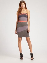 Form-fitting jersey knit styled with colorblocked panels in a sleek, body-con sheath.StraplessNotched necklineBodice dartsAsymmetrical panelsCriss-cross back panelAbout 17 from natural waist94% viscose/6% elastaneDry cleanMade in USA of Italian fabricModel shown is 5'8½ (174cm) wearing US size Small. Form-fitting jersey knit styled with colorblocked panels in a sleek, body-con sheath.StraplessNotched necklineBodice dartsAsymmetrical panelsCriss-cross back panelAbout 17 from natural waist94% viscose/6% elastaneDry cleanMade in USA of Italian fabricModel shown is 5'8½ (174cm) wearing US size Small.