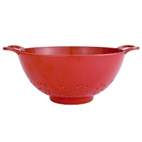 This 6-inch wide colander from Zak Designs Inc. features easy grip handles for rinsing and draining and a stable raised bottom. It is made of melamine and is resistant to acids, alkali, and stains. Dishwasher-safe. This 6-inch wide colander from Zak Designs Inc. features easy grip handles for rinsing and draining and a stable raised bottom. It is made of melamine and is resistant to acids, alkali, and stains. Dishwasher-safe.