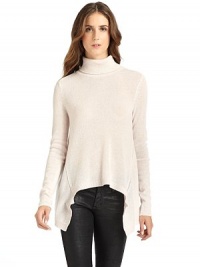 THE LOOKTurtleneckPullover styleLong sleevesAsymmetrical hemTHE FITAbout 31 from shoulder to longest point of hemTHE MATERIALCashmereCARE & ORIGINDry cleanImportedModel shown is 5'11 (180cm) wearing US size Small. THE LOOKTurtleneckPullover styleLong sleevesAsymmetrical hemTHE FITAbout 31 from shoulder to longest point of hemTHE MATERIALCashmereCARE & ORIGINDry cleanImportedModel shown is 5'11 (180cm) wearing US size Small.