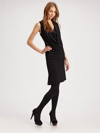 Draped jersey knit is defined by a deep cowlneck for a flattering silhouette.Sleeveless Draped neckline Gathered through the hips Pullover style About 37½ from shoulder to hem 70% rayon/27% polyester/3% spandex Dry clean Imported Draped jersey knit is defined by a deep cowlneck for a flattering silhouette.Sleeveless Draped neckline Gathered through the hips Pullover style About 37½ from shoulder to hem 70% rayon/27% polyester/3% spandex Dry clean Imported
