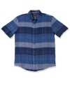 A man of many looks. Keep your plaid position fresh with this reversible shirt from American Rag.