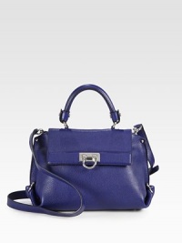 A chic and roomy design in luxurious pebbled leather; perfect for all your essentials.Top handle, 4½ dropDetachable adjustable shoulder strap, 19-22 dropFlip-lock flap closureOne outside zip pocketOne inside zip pocketTwo inside open pocketsCotton lining9W X 7H X 4½DImported A chic and roomy design in luxurious pebbled leather; perfect for all your essentials.Top handle, 4½ dropDetachable adjustable shoulder strap, 19-22 dropFlip-lock flap closureOne outside zip pocketOne inside zip pocketTwo inside open pocketsCotton lining9W X 7H X 4½DImported