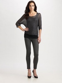 Textured metallic knit, loosely woven in a draped, semi-sheer pullover.BoatneckDropped shouldersThree-quarter sleeves40% metallic fibers/60% rayonDry cleanImportedModel shown is 5'9½ (176cm) wearing US size Small. Textured metallic knit, loosely woven in a draped, semi-sheer pullover.BoatneckDropped shouldersThree-quarter sleeves40% metallic fibers/60% rayonDry cleanImportedModel shown is 5'9½ (176cm) wearing US size Small.