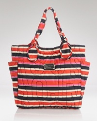 Tap into MARC BY MARC JACOBS' quirky brand of cool with the label's printed tote. In sporty-chic nylon, it's a high-energy favorite for lugging the essentials. Tap into MARC BY MARC JACOBS' quirky brand of cool with the label's printed tote. In sporty-chic nylon, it's a high-energy favorite for lugging the essentials.