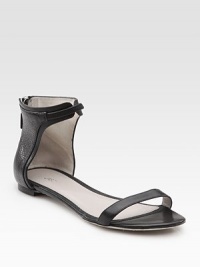Slightly textured leather makes its way around the ankle and concludes with a convenient back zipper. Leather upperBack zipperLeather lining and sole Padded insoleMade in ItalyOUR FIT MODEL RECOMMENDS ordering true size. Slightly textured leather makes its way around the ankle and concludes with a convenient back zipper. Leather upperBack zipperLeather lining and sole Padded insoleMade in ItalyOUR FIT MODEL RECOMMENDS ordering true size.