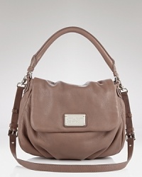 Take your accessories in a punched up direction with MARC BY MARC JACOBS' leather satchel. Take your accessories in a punched up direction with MARC BY MARC JACOBS' leather satchel.