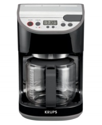 Krups keeps the days of the week straight for you with its dual auto-on feature that wakes the coffee machine up and adjusts to your weekday and weekend sleep schedule so a brew of aromatic coffee, enriched by the high-powered flavor extraction system, is there when you need it most. This 12-cup is so on top of it that it also has an indicator light that reminds you when a cleaning is necessary. 1-year limited warranty. Model KM4055. Krups keeps the days of the week straight for you with its dual auto-on feature that wakes the coffee machine up and adjusts to your weekday and weekend sleep schedule so a brew of aromatic coffee, enriched by the high-powered flavor extraction system, is there when you need it most. This 12-cup is so on top of it that it also has an indicator light that reminds you when a cleaning is necessary. 1-year limited warranty. Model KM4055.