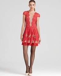 This festive, party-perfect BCBGMAXAZRIA dress lends a provocative optical illusion thanks to the mesh front inset and flaunts the lace trend (and obsession) of the season. This festive, party-perfect BCBGMAXAZRIA dress lends a provocative optical illusion thanks to the mesh front inset and flaunts the lace trend (and obsession) of the season.
