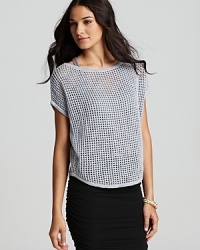 Boasting an open knit, this James Perse top is the perfect lightweight layer for summer. Boasting an open knit, this James Perse top is the perfect lightweight layer for summer.