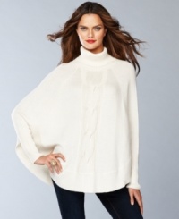 INC updates a poncho sweater with a metallic-flecked cabled front. The super-soft knit features a silk and angora for the ultimate in luxe coziness. INC updates a poncho sweater with a metallic-flecked cabled front. The super-soft knit features a silk and angora for the ultimate in luxe coziness.