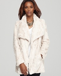 Slipped over cocktail looks or dressed down with denim, this Karen Kane fax-fur jacket lends a luxe layer to your everyday style. Slipped over cocktail looks or dressed down with denim, this Karen Kane fax-fur jacket lends a luxe layer to your everyday style.