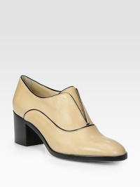 Timeless oxford in fine Italian leather with contrasting trim. Stacked heel, 2¼ (60mm)Leather upperLeather lining and solePadded insoleMade in ItalyOUR FIT MODEL RECOMMENDS ordering one half size up as this style runs small. Timeless oxford in fine Italian leather with contrasting trim. Stacked heel, 2¼ (60mm)Leather upperLeather lining and solePadded insoleMade in ItalyOUR FIT MODEL RECOMMENDS ordering one half size up as this style runs small.
