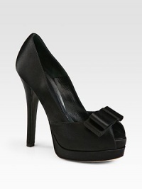 Evening-perfect satin platform pump has a peep toe and elegant bow adornment. Self-covered heel, 5 (125mm)Covered platform, 1 (25mm)Compares to a 4 heel (100mm)Satin upperPeep toeLeather lining and solePadded insoleMade in ItalyOUR FIT MODEL RECOMMENDS ordering one size up as this style runs small. Evening-perfect satin platform pump has a peep toe and elegant bow adornment. Self-covered heel, 5 (125mm)Covered platform, 1 (25mm)Compares to a 4 heel (100mm)Satin upperPeep toeLeather lining and solePadded insoleMade in ItalyOUR FIT MODEL RECOMMENDS ordering one size up as this style runs small.
