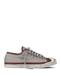 A cool update on a classic style, this Jack Purcell sneaker sports a suede upper with contrast leather trim. A cool update on a classic style, this Jack Purcell sneaker sports a suede upper with contrast leather trim.
