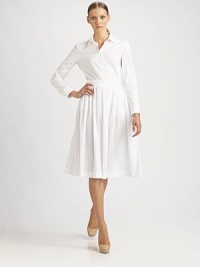This classic, impeccably tailored silhouette gets an update from subtle, delicate pleats on the collar.Pleated shirt collarLong sleeves with button cuffsFront button placketDartsAbout 23 from shoulder to hemCottonDry cleanMade in Italy of imported fabricModel shown is 5'10 (177cm) wearing US size 4. This classic, impeccably tailored silhouette gets an update from subtle, delicate pleats on the collar.Pleated shirt collarLong sleeves with button cuffsFront button placketDartsAbout 23 from shoulder to hemCottonDry cleanMade in Italy of imported fabricModel shown is 5'10 (177cm) wearing US size 4.