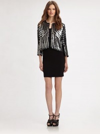 Structured silk topper with contrasting sequins form glimmering stripes. CrewneckOpen frontThree-quarter sleevesSequin-coated silkDry cleanImportedModel shown is 5'10 (177cm) wearing US size Small. Structured silk topper with contrasting sequins form glimmering stripes. CrewneckOpen frontThree-quarter sleevesSequin-coated silkDry cleanImportedModel shown is 5'10 (177cm) wearing US size Small.