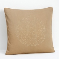Embellished with an embroidered medallion in the center, this pillow is tailored to style in any modern setting. Embellished with an embroidered medallion in the center, this pillow is tailored to style in any modern setting.