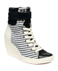 Wallflowers need not apply. Standing out is the only option with the bold-as-can-be Perri wedge sneakers by Nine West Original. Wallflowers need not apply. Standing out is the only option with the bold-as-can-be Perri wedge sneakers by Nine West Original.