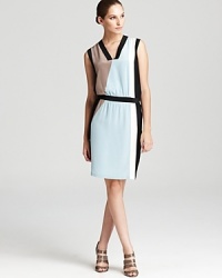 Clean lines and crisp color blocking lend artistic inspiration to a silk RAOUL dress, contoured with contrast trim for a feminine silhouette. Clean lines and crisp color blocking lend artistic inspiration to a silk RAOUL dress, contoured with contrast trim for a feminine silhouette.