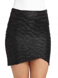 THE LOOKAllover asymmetric ruchingAsymmetric hemSide zip with hook-and-eye closureTHE FITAbout 16 from waist to hemTHE MATERIALPolyester/lycraCARE & ORIGINDry cleanMade in USAModel shown is 5'8 (172½cm) wearing US size Small. THE LOOKAllover asymmetric ruchingAsymmetric hemSide zip with hook-and-eye closureTHE FITAbout 16 from waist to hemTHE MATERIALPolyester/lycraCARE & ORIGINDry cleanMade in USAModel shown is 5'8 (172½cm) wearing US size Small.