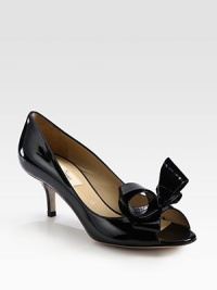 Simply divine patent leather with a kitten heel, peep toe and oversized bow adornment. Self-covered heel, 2½ (65mm)Patent leather upperLeather lining and solePadded insoleMade in Italy Simply divine patent leather with a kitten heel, peep toe and oversized bow adornment. Self-covered heel, 2½ (65mm)Patent leather upperLeather lining and solePadded insoleMade in Italy