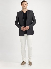 The next step in modern menswear: a blazer tailored from fine virgin wool with a concealed button closure and leather trim along the narrow lapel. Concealed two-button closureChest besom, waist flap pocketsFully linedAbout 29½ from shoulder to hemVirgin wool with lamb leatherDry cleanMade in Italy The next step in modern menswear: a blazer tailored from fine virgin wool with a concealed button closure and leather trim along the narrow lapel. Concealed two-button closureChest besom, waist flap pocketsFully linedAbout 29½ from shoulder to hemVirgin wool with lamb leatherDry cleanMade in Italy