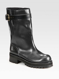 Functionality meets style in this design of calf leather,with an adjustable belt buckle, side gores and wool lining. Rubber heel, 1¾ (45mm)Rubber platform, 1 (25mm)Compares to a ¾ heel (20mm)Shaft, 9½Leg circumference, 14Leather upperPull-on styleWool liningRubber trek solePadded insoleMade in Italy Functionality meets style in this design of calf leather,with an adjustable belt buckle, side gores and wool lining. Rubber heel, 1¾ (45mm)Rubber platform, 1 (25mm)Compares to a ¾ heel (20mm)Shaft, 9½Leg circumference, 14Leather upperPull-on styleWool liningRubber trek solePadded insoleMade in Italy
