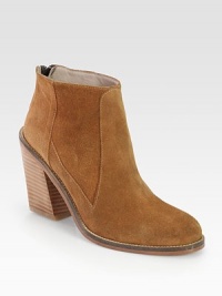 Ankle-grazing suede style with a wide, stacked heel, convenient back zipper and leather trim. Stacked heel, 3 (75mm)Suede upper with leather trimBack zipperLeather lining and solePadded insoleImportedOUR FIT MODEL RECOMMENDS ordering true whole size; ½ sizes should order the next whole size up. Ankle-grazing suede style with a wide, stacked heel, convenient back zipper and leather trim. Stacked heel, 3 (75mm)Suede upper with leather trimBack zipperLeather lining and solePadded insoleImportedOUR FIT MODEL RECOMMENDS ordering true whole size; ½ sizes should order the next whole size up.