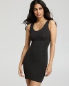 This ultra-thin tank slip streamlines the silhouette, flattering your chest while flattening the tummy. From SPANX®.
