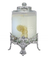 Hold court with the regal elegance of Fleur de Lis serveware and serving dishes. Lavish detail featuring the iconic French lily evoke another era, gleaming spectacularly on this magnificent beverage server from Arthur Court. Hold court with the regal elegance of Fleur de Lis serveware and serving dishes. Lavish detail featuring the iconic French lily evoke another era, gleaming spectacularly on this magnificent beverage server from Arthur Court.