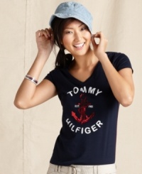 Shine on in Tommy Hilfiger's nautical tee, featuring a large logo and anchor crafted from sparkling sequins. Shine on in Tommy Hilfiger's nautical tee, featuring a large logo and anchor crafted from sparkling sequins.