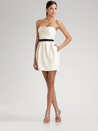 Delicate rosettes and textured trim along the bodice are purely feminine details on this lovely strapless design. Contrast waistband Pleating detail Back zipper About 17 from natural waist Cotton/polyester/metallic; dry clean Imported Delicate rosettes and textured trim along the bodice are purely feminine details on this lovely strapless design. Contrast waistband Pleating detail Back zipper About 17 from natural waist Cotton/polyester/metallic; dry clean Imported