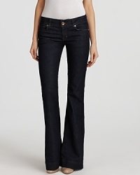 Work J Brand's dark-wash, flare-leg jeans for a directional, 70's-inspired silhouette. Work J Brand's dark-wash, flare-leg jeans for a directional, 70's-inspired silhouette.
