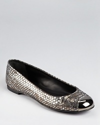Metallic, snakeskin embossed leather is trimmed in gleaming metal at the toe on Giuseppe Zanotti's Malika ballet--edgy in gunsmoke grey. Metallic, snakeskin embossed leather is trimmed in gleaming metal at the toe on Giuseppe Zanotti's Malika ballet--edgy in gunsmoke grey.