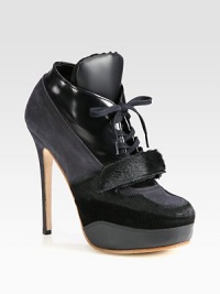 Luxe calf hair trim tops this sky-high platform ankle boot of suede and contrasting leather. Suede-covered heel, 5¼ (130mm)Hidden platform, 1½ (40mm)Compares to a 3¾ heel (95mm)Suede, calf hair and leather upper with velcro strapLeather lining and solePadded insoleMade in Italy Luxe calf hair trim tops this sky-high platform ankle boot of suede and contrasting leather. Suede-covered heel, 5¼ (130mm)Hidden platform, 1½ (40mm)Compares to a 3¾ heel (95mm)Suede, calf hair and leather upper with velcro strapLeather lining and solePadded insoleMade in Italy