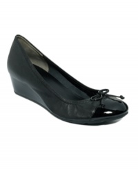 Cole Haan takes comfort and cuteness and ties it up with a bow. Air Tali wedges come in a variety of fashion-forward finishes with Nike AIR technology to cushion every step. Cole Haan takes comfort and cuteness and ties it up with a bow. Air Tali wedges come in a variety of fashion-forward finishes with Nike AIR technology to cushion every step.
