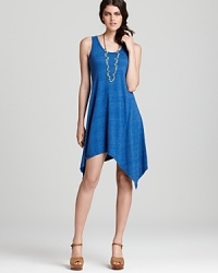 An asymmetrical hem lends cutting-edge style to this easy-breezy C&C California dress, rendered in a rich hue. An asymmetrical hem lends cutting-edge style to this easy-breezy C&C California dress, rendered in a rich hue.