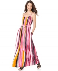 Calvin Klein's striped maxi is on the spring must-have list with its colorful print and chic style. Calvin Klein's striped maxi is on the spring must-have list with its colorful print and chic style.