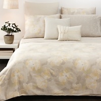 A textured dobby design of small diamonds, in coordinating colors that complement the beds. A textured dobby design of small diamonds, in coordinating colors that complement the beds.