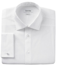 Elevate your basics with this French-cuffed shirt from the master of modern tailoring, Calvin Klein. Elevate your basics with this French-cuffed shirt from the master of modern tailoring, Calvin Klein.