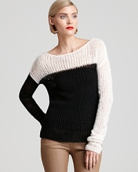 A vision in black and white, this breezy knit MARC BY MARC JACOBS sweater epitomizes casual-chic. A vision in black and white, this breezy knit MARC BY MARC JACOBS sweater epitomizes casual-chic.