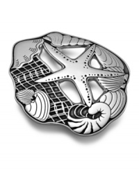 Dive right in. The Seashore trivet is artfully embellished with underwater creatures and, in Wilton Armetale's innovative metal, stands up to super-hot or ice-cold serving pieces with no problem at all. Dive right in. The Seashore trivet is artfully embellished with underwater creatures and, in Wilton Armetale's innovative metal, stands up to super-hot or ice-cold serving pieces with no problem at all.