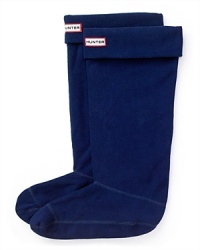 Fleece socks to line your Hunter boots and keep your feet cozy and dry. Solid socks with Hunter logo patch at upper front. Fleece socks to line your Hunter boots and keep your feet cozy and dry. Solid socks with Hunter logo patch at upper front.