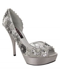 Sparkle alert! With so many beads and sequins, the Sadi evening pumps by Nina will be the centerpiece of the party. Wallflowers need not apply. Sparkle alert! With so many beads and sequins, the Sadi evening pumps by Nina will be the centerpiece of the party. Wallflowers need not apply.