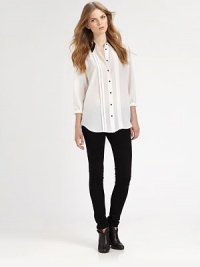 Contrasting point collar, button front and strategic pleating amplify this relaxed silk basic. Point collarButton frontFront pleatsLong sleeves with buttoned cuffsPleated back yokeShirttail hem hits below the hipsSilkDry cleanImportedModel shown is 5'10 (177cm) wearing US size Small. Contrasting point collar, button front and strategic pleating amplify this relaxed silk basic. Point collarButton frontFront pleatsLong sleeves with buttoned cuffsPleated back yokeShirttail hem hits below the hipsSilkDry cleanImportedModel shown is 5'10 (177cm) wearing US size Small.